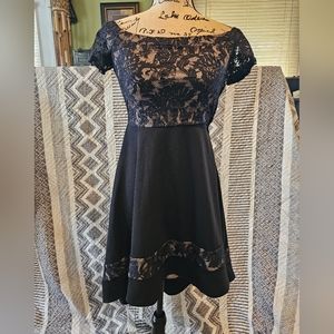 Black form dress with lace